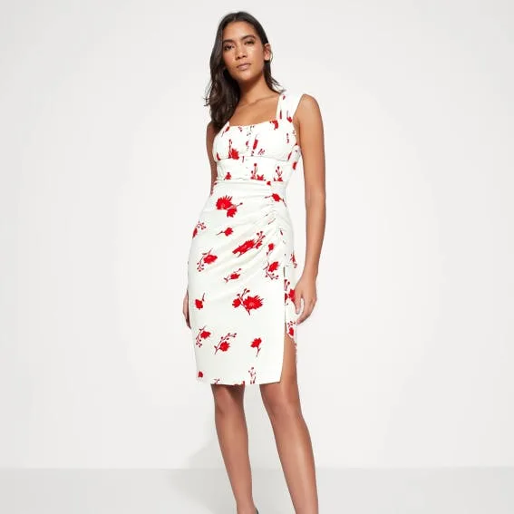 AI generated model wearing the white dress with red floral print