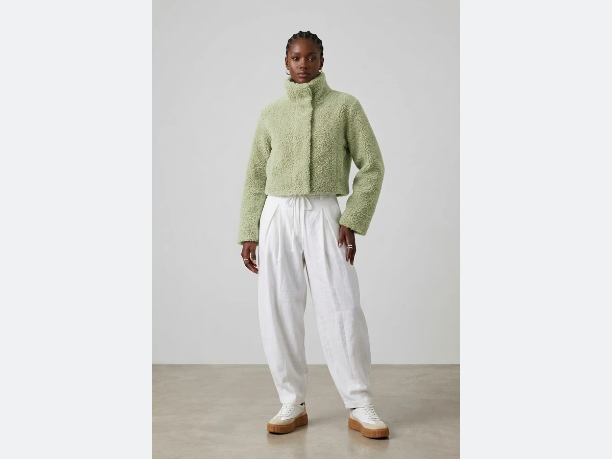 The same photograph, the same jacket, recoloured to sage green