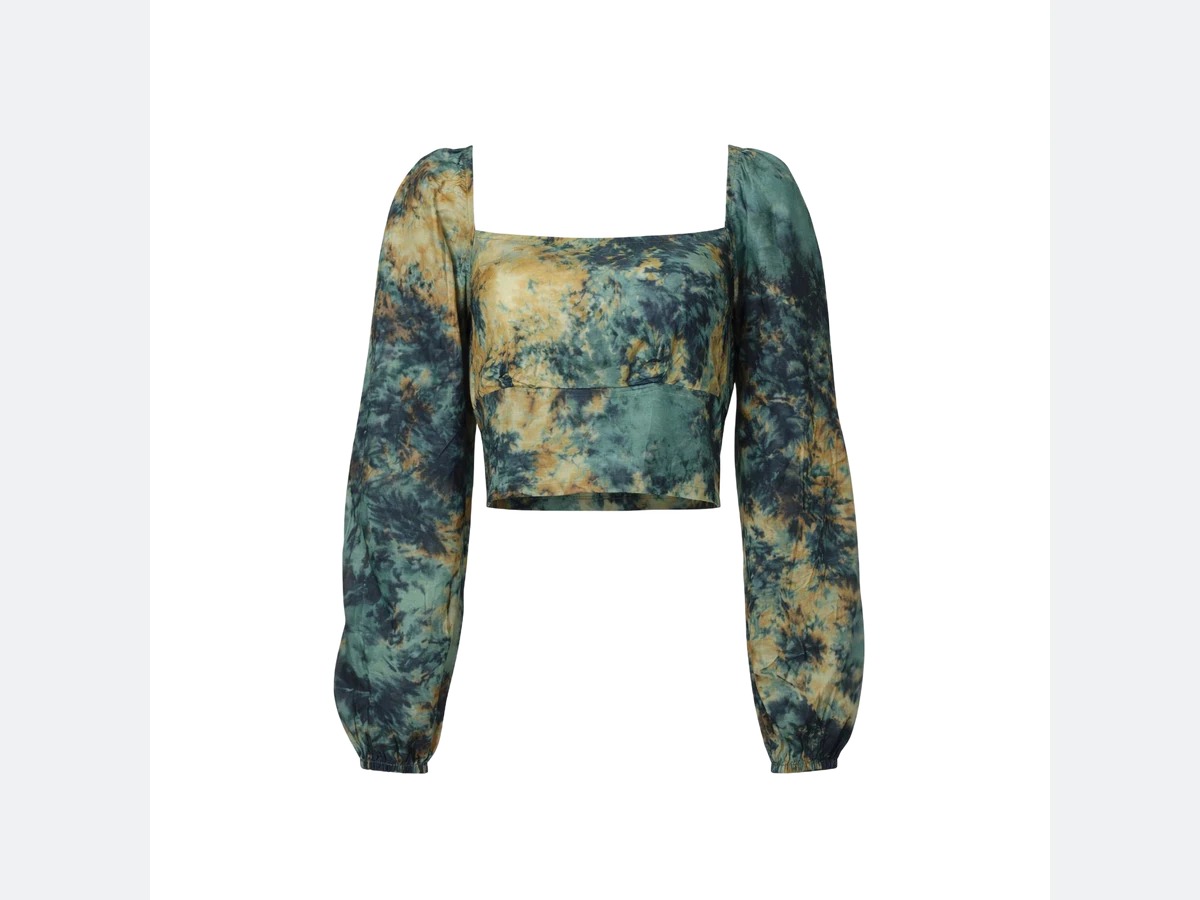 A cropped tie dye top, the garment the print is taken from
