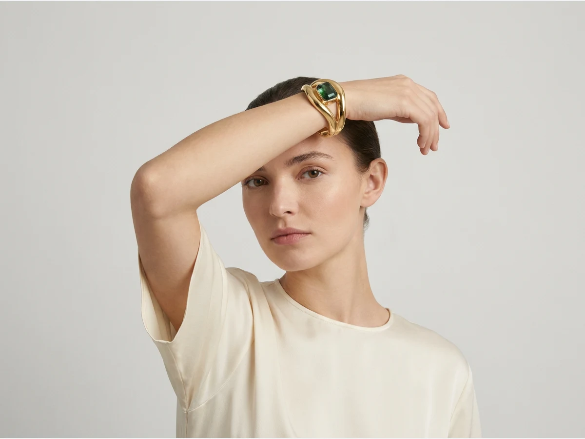 a model photographed to show a piece of jewelry, a bracelet on the wrist