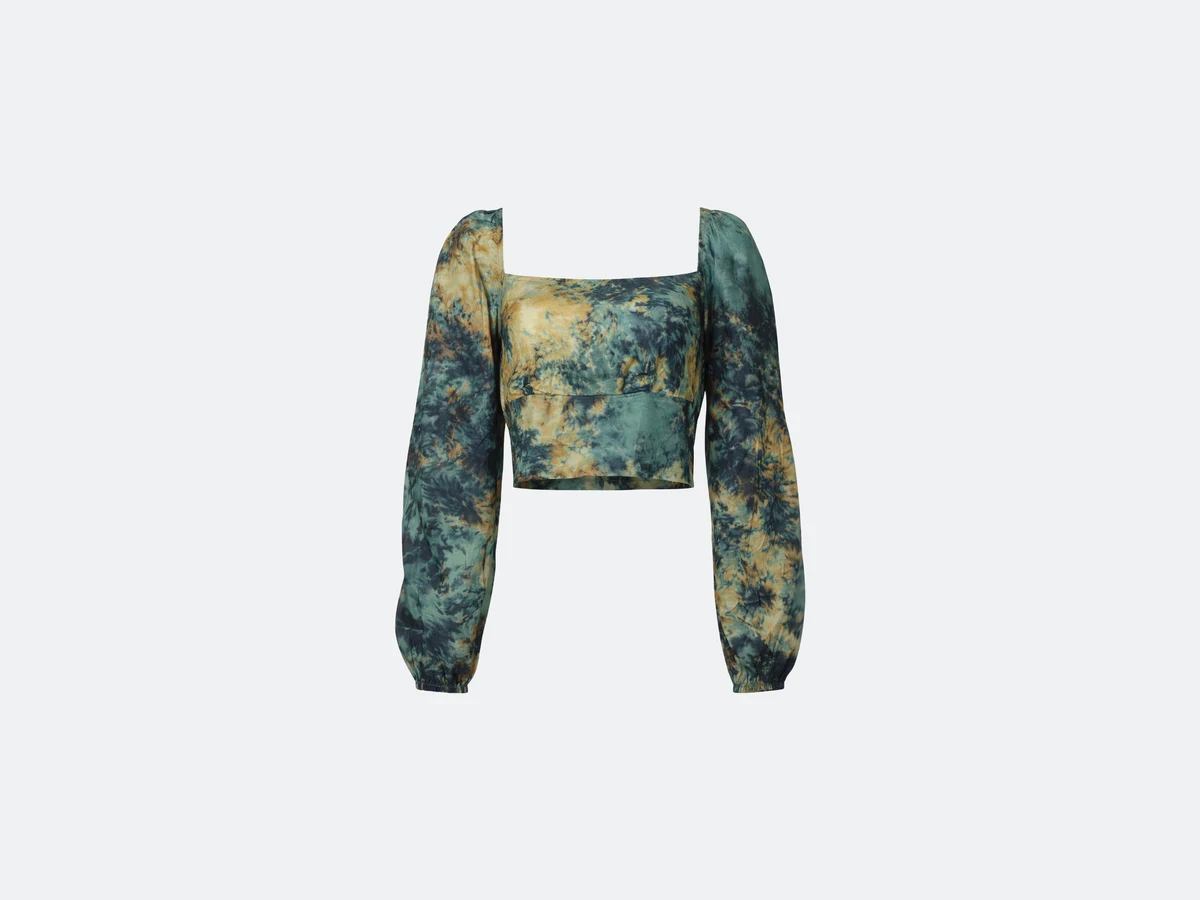 A tie-dye cropped top photographed flat, the only input the chain starts from