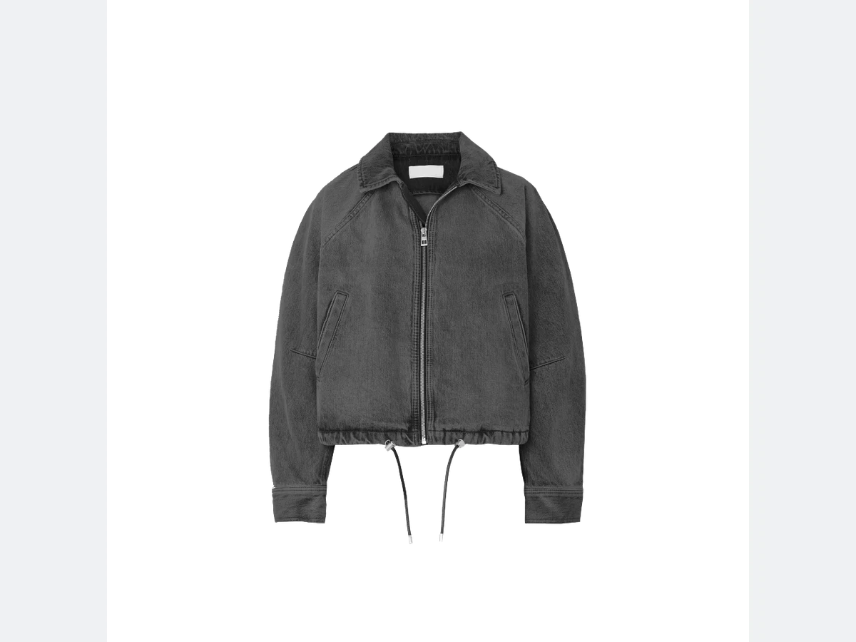 A grey denim jacket photographed flat, the kind of product shot the sketch is read from