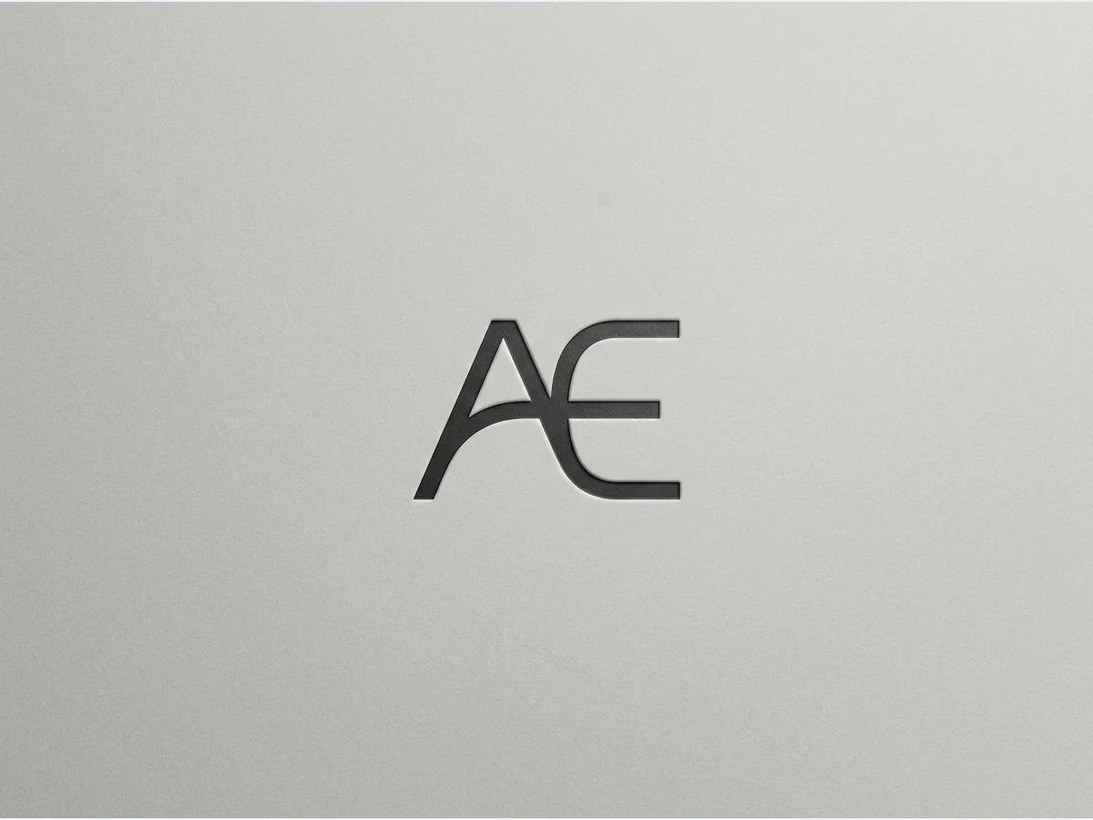 a fashion brand logotype on a plain ground, a minimal monogram
