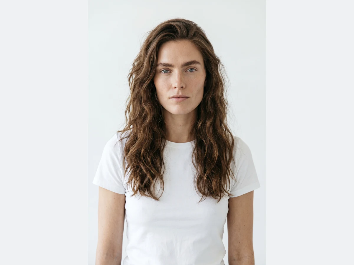 A model photographed in the studio, before the retouch