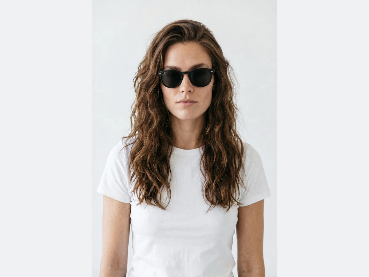 The same photograph with sunglasses added, pose, light and skin untouched