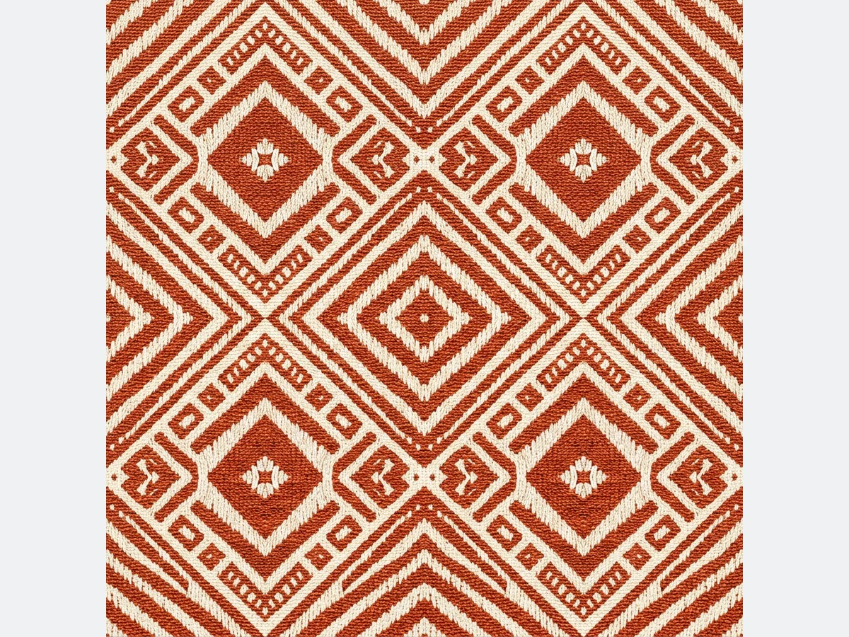 A geometric repeat from the same studio, in terracotta and cream