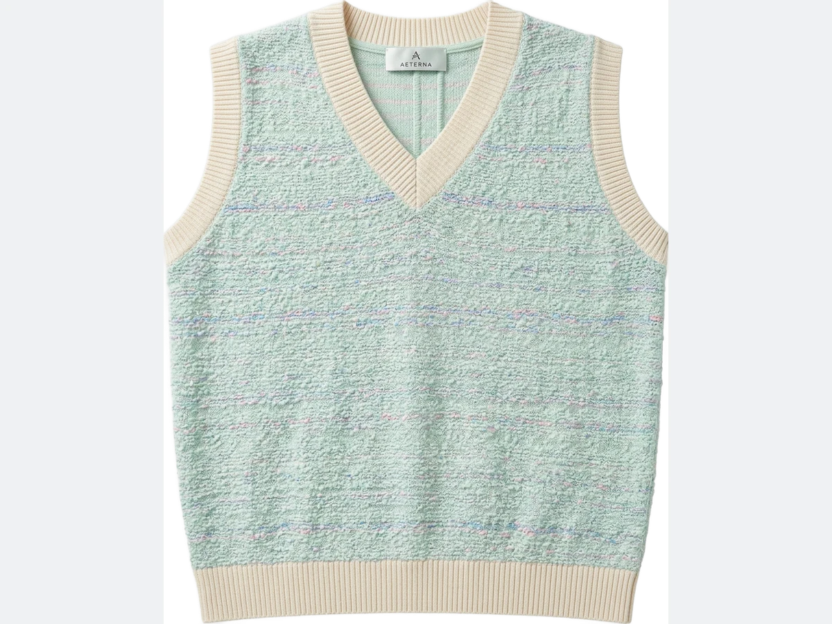 The finished vest, generated from the drawing alone, the same neckline, the same ribbed hem