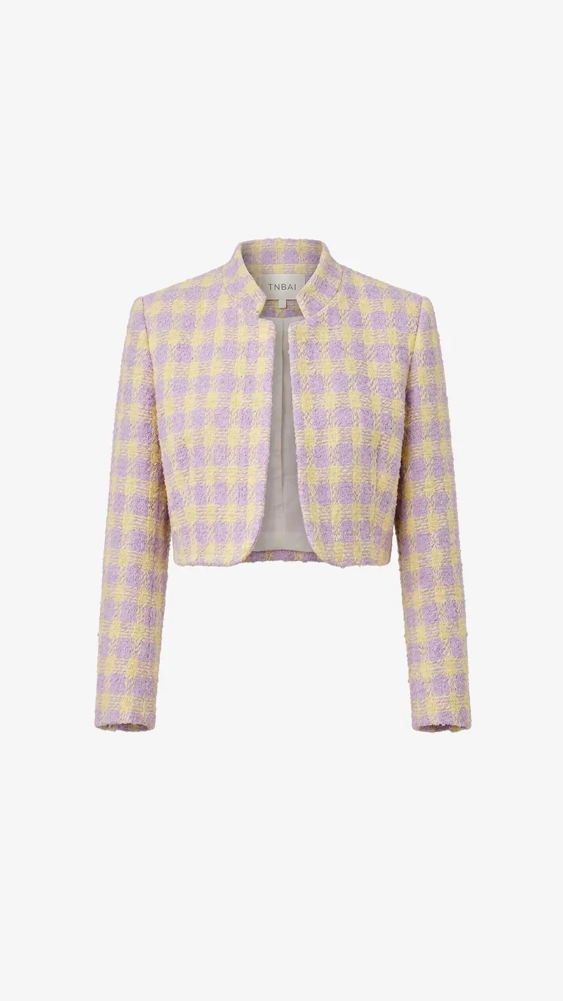 A cropped lilac and butter check jacket